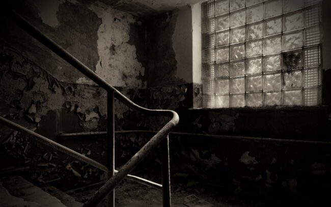 A fine art photography series by Menno van der Meulen capturing abandoned rooms, decaying staircases, peeling walls, and the atmospheric silence of forgotten spaces. Shot in 2025, exploring memory, absence, and the remnants of human presence.